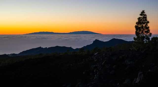Sunset from Teide plateau in Tenerife with La Gomera in the back