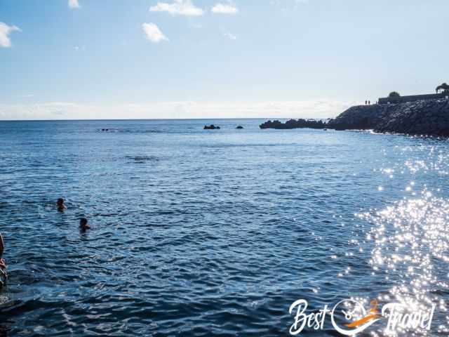 Swimmers in the bay of Fanal