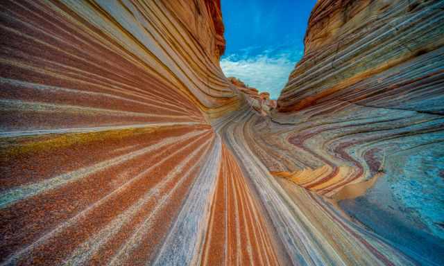 A colourful narrow slot in the Wave rock formation