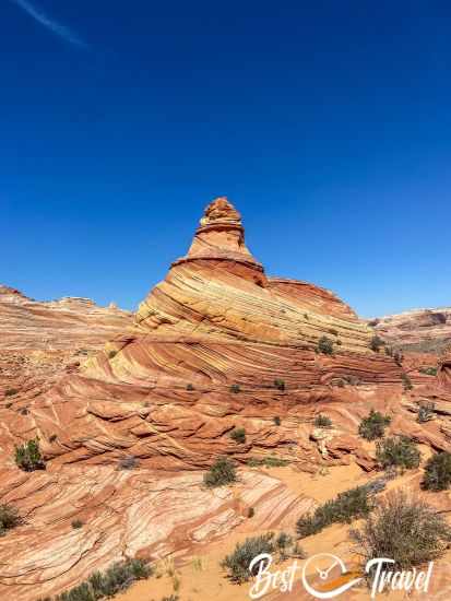 A colourful swirled sandstone formation.