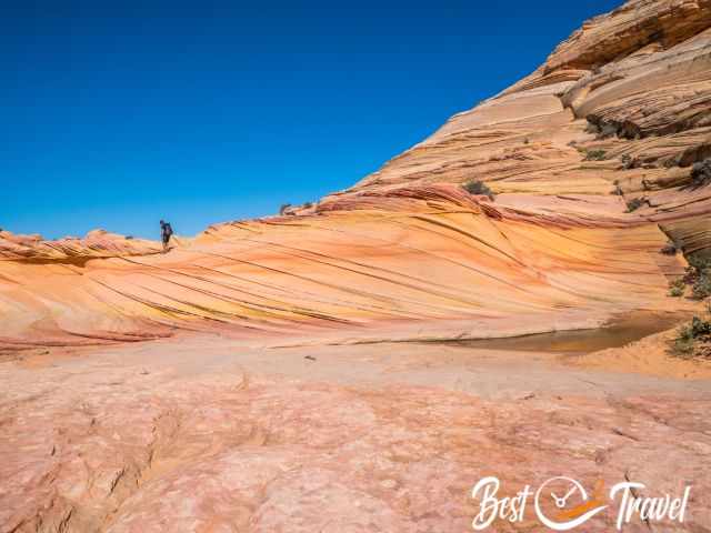 A hiker at the colourful Second Wave.