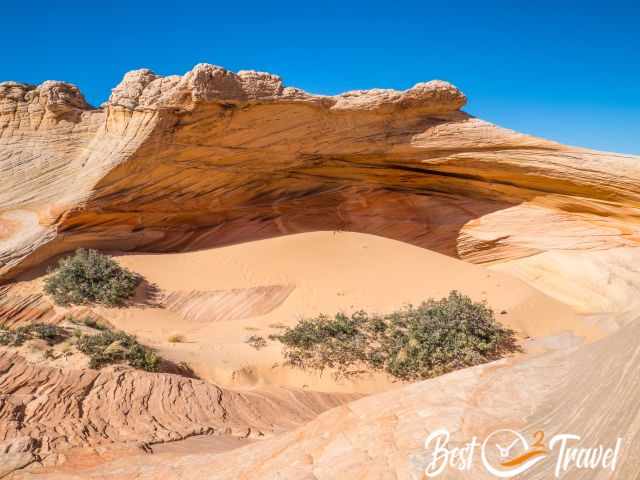 A part of the Alcove with a sand dune in front.