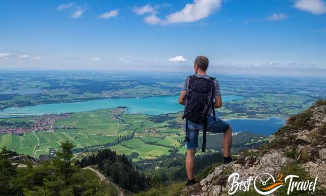 A hiker looking enjoying the view to Foggensee