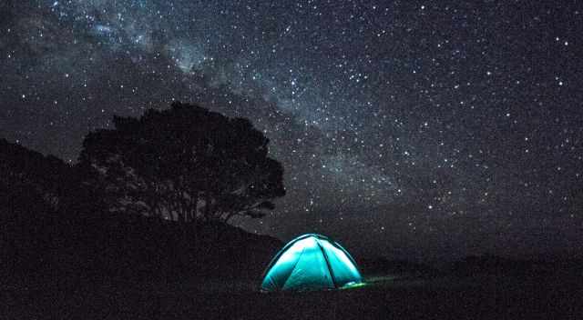 Tent and a clear night sky full of stars