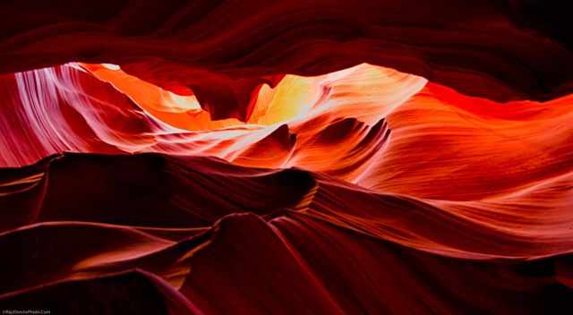Upper Antelope view up to orange, red, and purple sandstone sparkling with the light from above the slot canyon