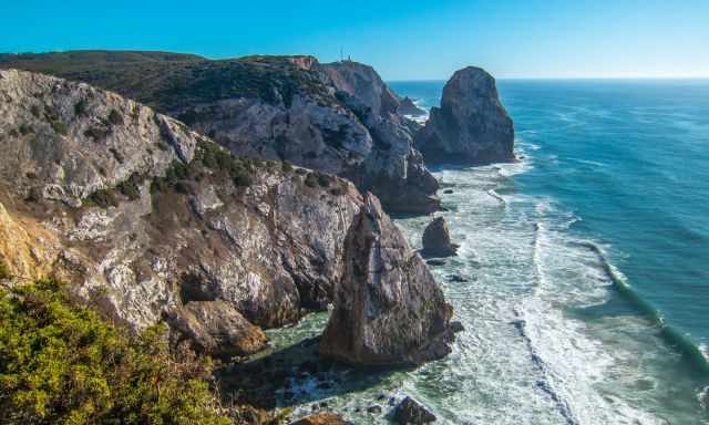 View from the coastal cliffs to Praia da Ursa in the distance.