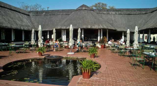 Me outside on the terrace of the Vic Falls Hotel