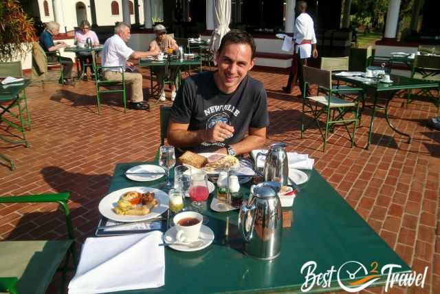 Man at breakfast in the Vic Falls Hotel