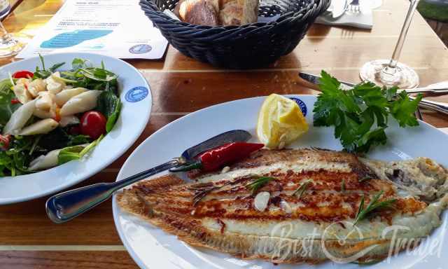 Fish grilled in one of the fish restaurants at Victuals Market