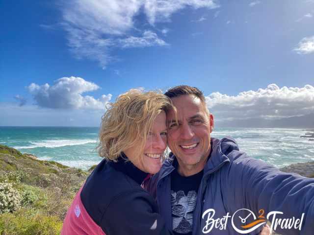 A couple in Walker Bay Nature Reserve with a blue sky