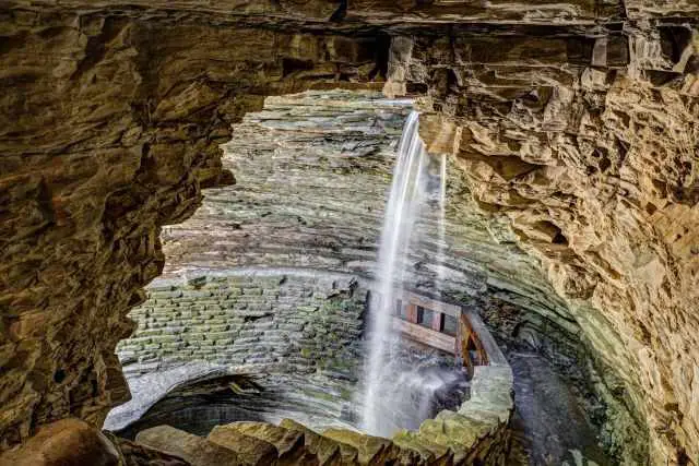 The waterfall and path in Cavern Cascade