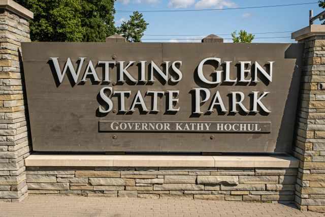 The entrance sign in metal at Watkins Glen State Park