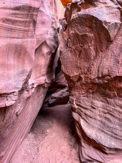 The view into a slot canyon with curves