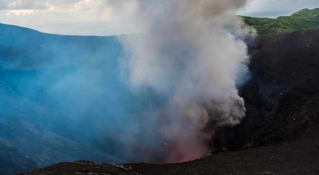 An ash cloud coming out of the crater