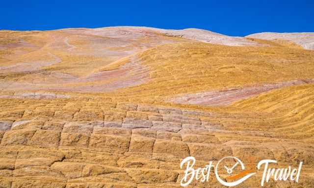 Yellow Rock with yellow wave-like sandstone formations