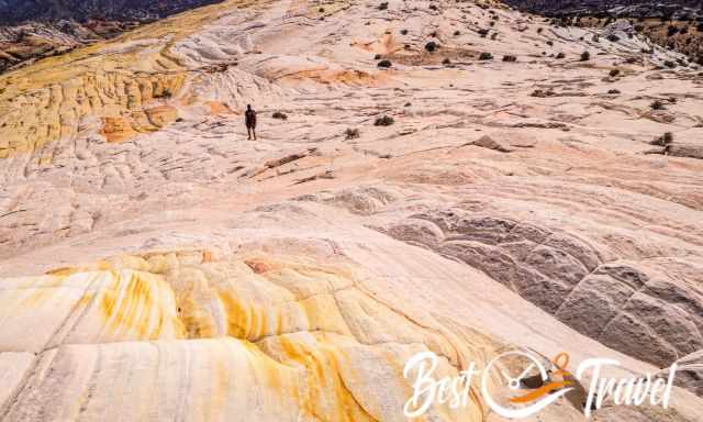 A hiker on the huge Yellow Rock